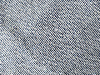 Fototapeta na wymiar Denim background texture for design. Canvas denim texture. Blue denim that can be used as background. Blue jeans texture for any background. Denim jeans texture.
