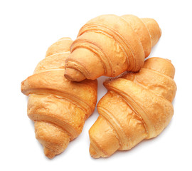 Tasty croissants on white background