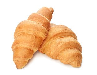 Tasty croissants on white background