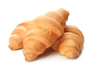 Tasty croissants on white background