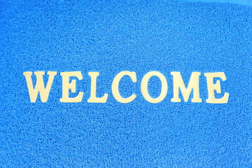 The doormat of welcome text