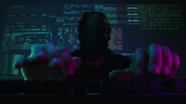 Masked Hacker Fingers Typing On Computer Backlit Night Criminal Cyber Attack Machine Learning Slow Motion Macro 8k