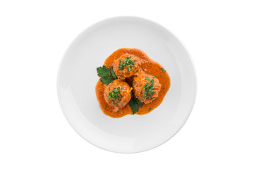 meatballs in tomato sauce on white plate isolated on white background