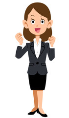 張り切るスーツの女性の全身