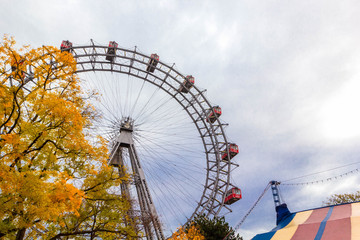 Ferris wheel with red retro cabs in Prater. Vienna Giant Wheel in Amusement Park, Vienna, Austria
