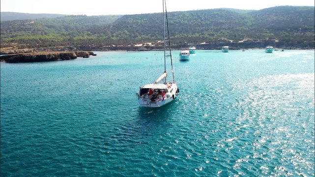 Boats and yachts moored at blue lagoon near Akamas peninsula. Cyprus