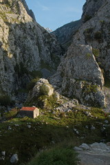 Old stone hut at the hiking track Ruta del Cares from Poncebos to Cain in Picos de Europa in Asturia,Spain,Europe