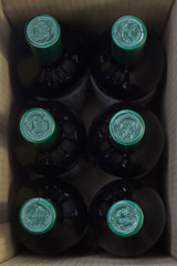 cardboard box with bottles of wine