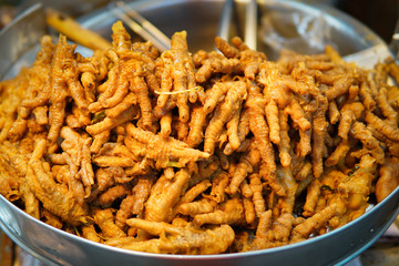 Stewed chicken feet is a delicacy.