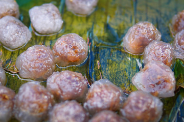 Thai dessert food Steamed Tapioca dumpling sago balls with pork filling traditional thai appetizer street food called Saku Sai Moo