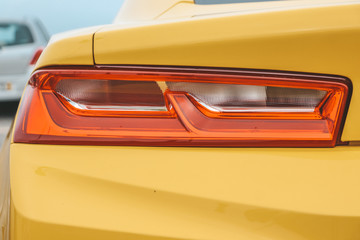 Obraz na płótnie Canvas Yellow super sport car tailights