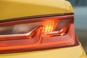Yellow super sport car tailights