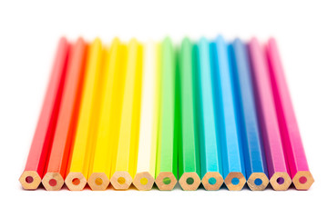 Colorful wooden pencils on a white background