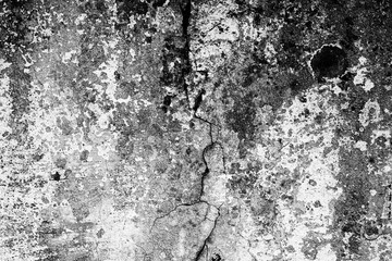 Texture of a concrete wall with cracks and scratches which can be used as a background