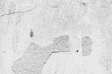 Texture of a concrete wall with cracks and scratches which can be used as a background