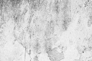 Texture of a concrete wall with cracks and scratches which can be used as a background