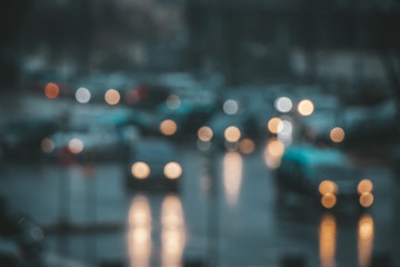 Unfocused picture of traffic in rainy day