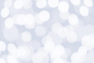 Beautiful sparkle silver and white abstract bokeh background.