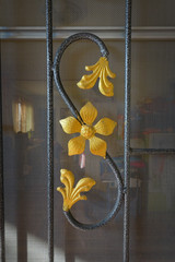 detail of a metal flower art work in wrought iron