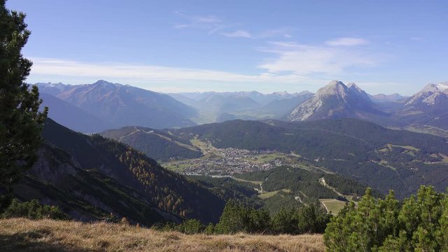 View from the top of Seefelderspitze overlooking Seefeld in Tirol and the mountains of the alps. Austria