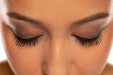 closeup of female natural eyelashes with mascara