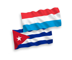 Flags of Cuba and Luxembourg on a white background