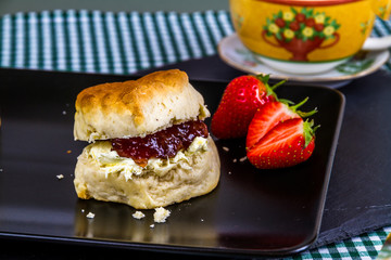 Cream tea, English scone, jam, cream, cup
