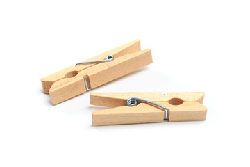 Brown wood clothes peg or clothespin on white background. - Image