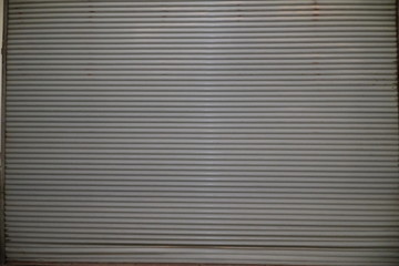 background of the sliding and dirty steel sliding door is closed.
