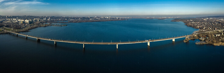 Aerial panoramic view on the South bridge across the Dnieper river in Dnipro city.