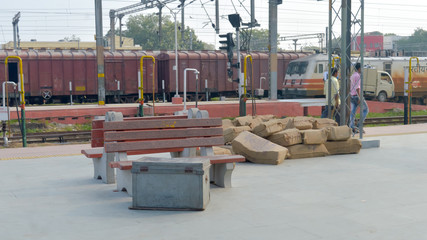 View of Box container on indian railway station platform near railway yard before loading on goods...