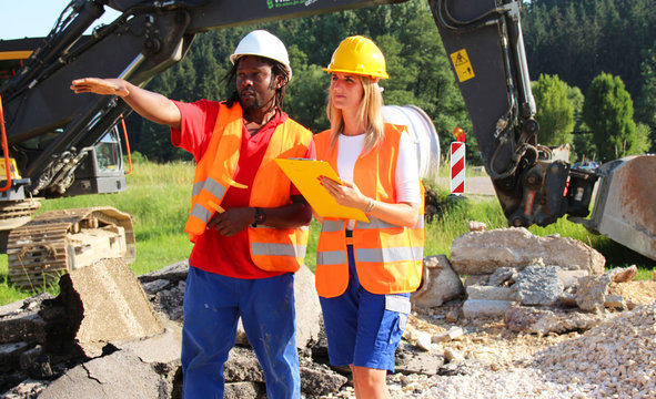 Team colleagues on a Construction site brainstorming