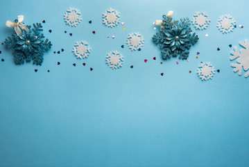 Christmas or winter composition. Pattern made of snowflakes on pastel blue background.