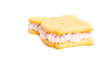 Baking cookies mouse sandwich on a white plate with cream