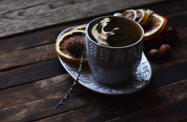 Cup of tea dried oranges still life
