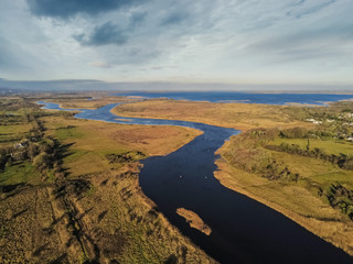 River and lake Corrib, Aerial view, County Galway, Ireland, Sunny day, Cloudy sky.