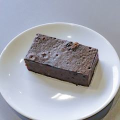 Delicious dark chocolate fudge on white plate