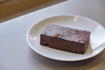 Delicious dark chocolate fudge on white plate
