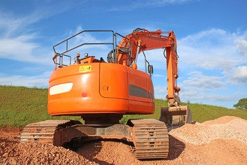 Digger on a road construction site