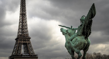 Fototapeta na wymiar Equestrian statue of La France renaissante with the Tour Eiffel in the background, at the Bir-Hakeim bridge, Paris, Ile-de-France, France