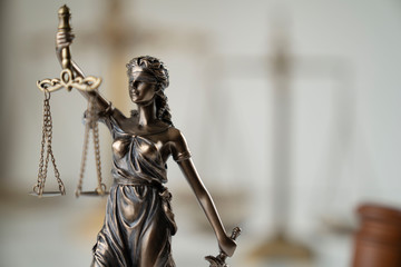 Law symbol composition. Gavel of the judge, Themis statue and scale of justice on off-white background.