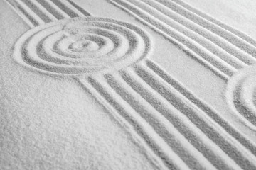 Fototapeta na wymiar White sand with pattern as background. Zen, meditation, harmony