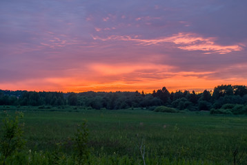 Summer colorful landscape - sunset and river