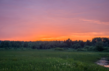 Summer colorful landscape - sunset and river