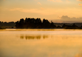 Naklejka premium Summer colorful landscape - sunset and river