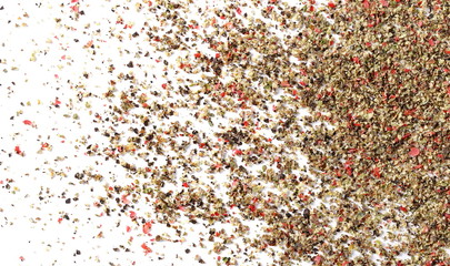 Colorful minced, ground pepper mix pile isolated on white background, top view