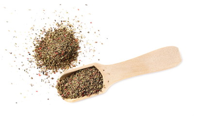 Colorful crushed pepper mix, flakes in wooden spoon isolated on white background, top view