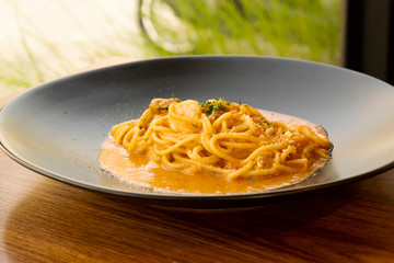 Spaghetti Seafood Sauce on a Black Plate