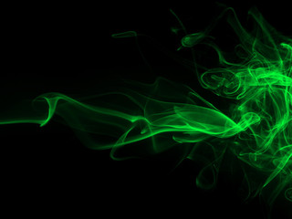 Beautiful green smoke abstract on black backgroud for design