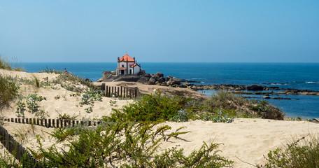 The chapel of senhor da pedra on the portuguese coast near coimbra just outside porto portugal © TristanBalme